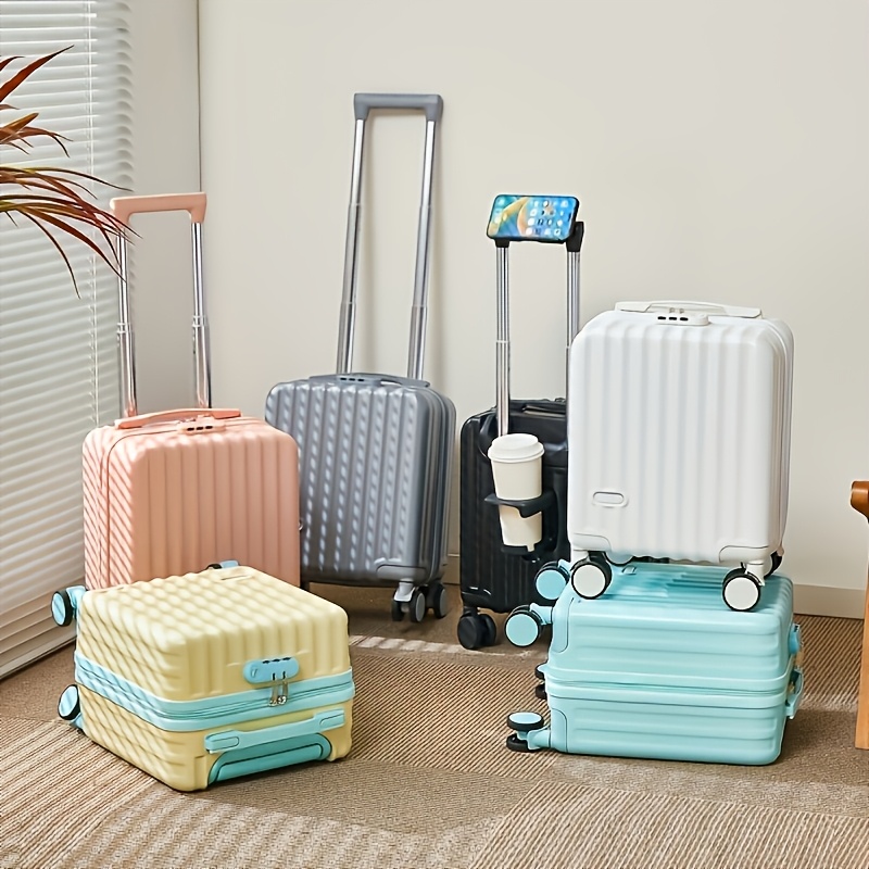 Compact wheeled suitcase, listed as 14 inches