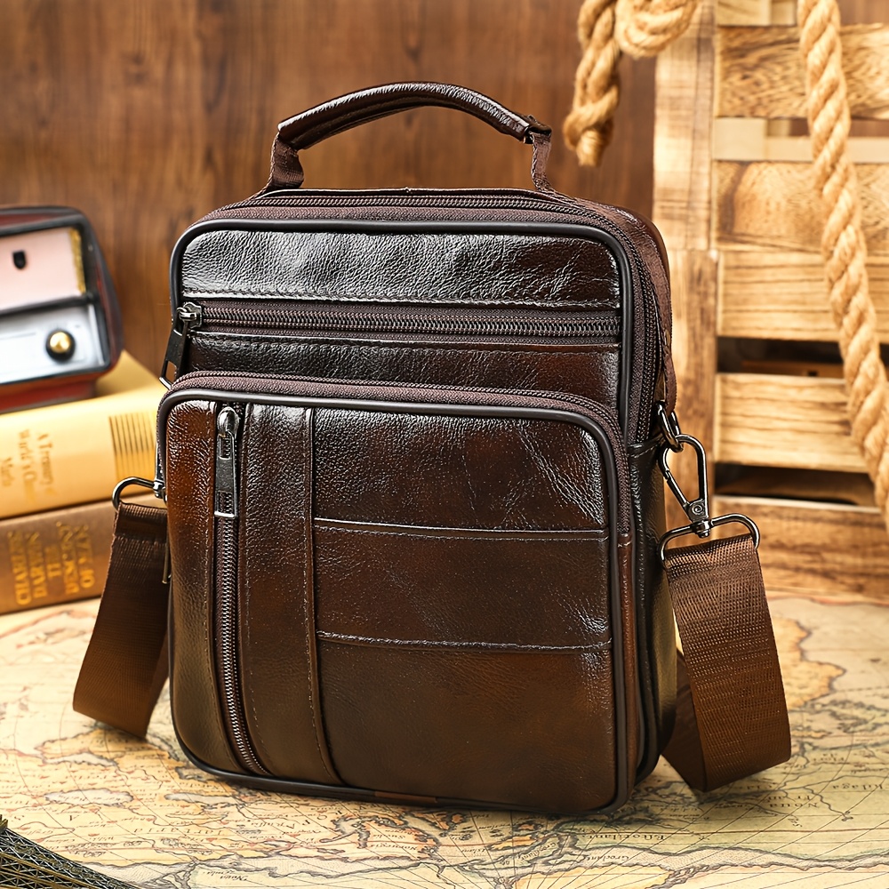 Messenger-style shoulder bag with several compartments