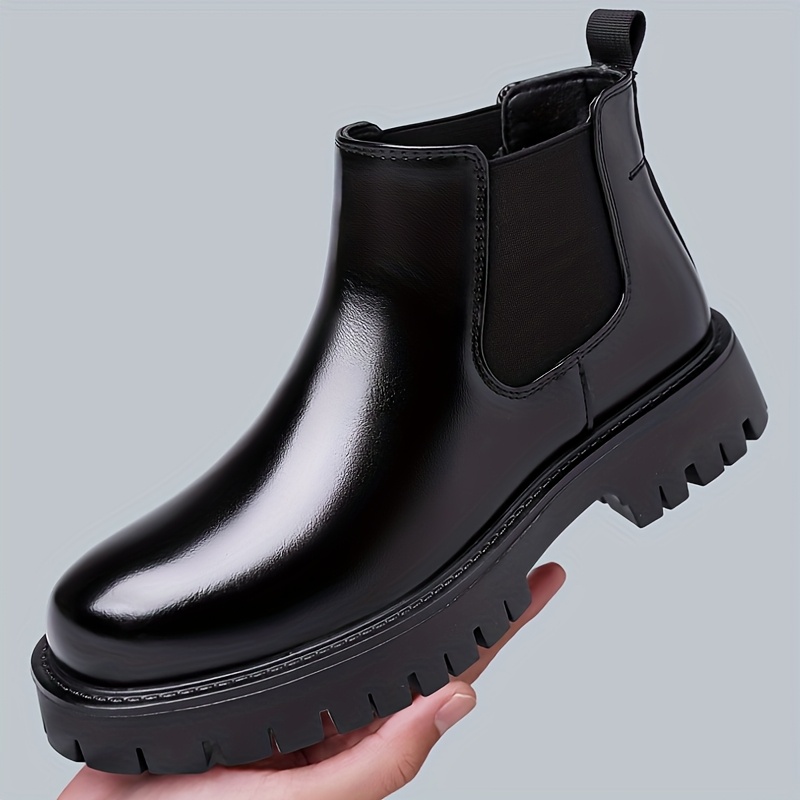 Black Chelsea boots with platform sole