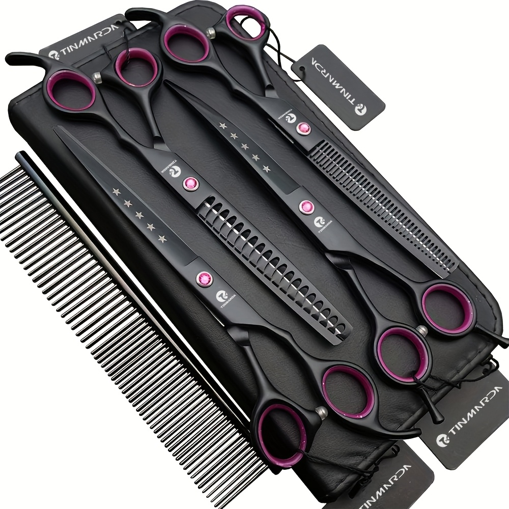 Four dog-grooming scissors with comb